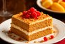 Миниатюра новости: Медовик, который круче, чем в дорогой кондитерской: за 5 минут все смешала и в духовку - пальчики оближешь