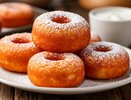 За считанные минуты для чая или кофе: рецепт хрустящих творожных пончиков без дрожжей: быстро, просто и очень вкусно